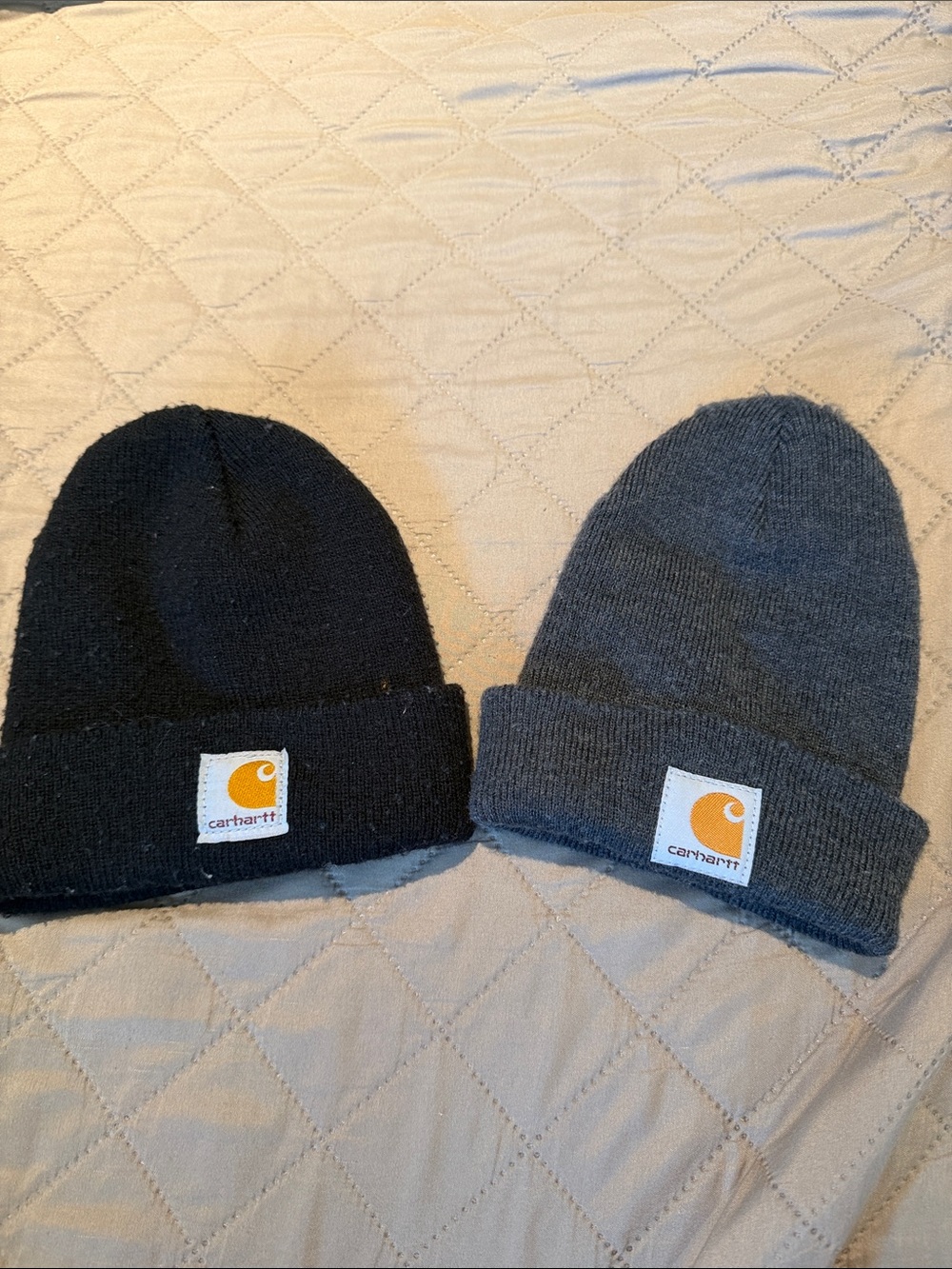 Pair of toddler Carhartt winter hats